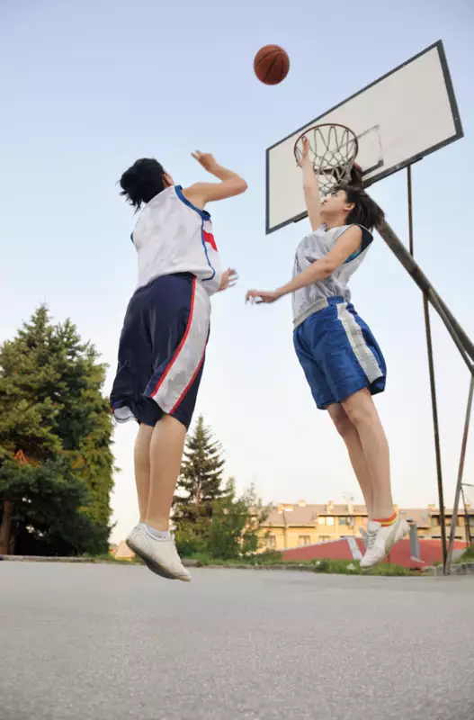 woman-basketball-player-have-treining-exercise-basketball-court-city-street